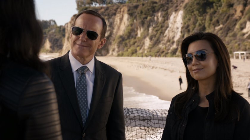 Coulson and May with Faro beach in background.