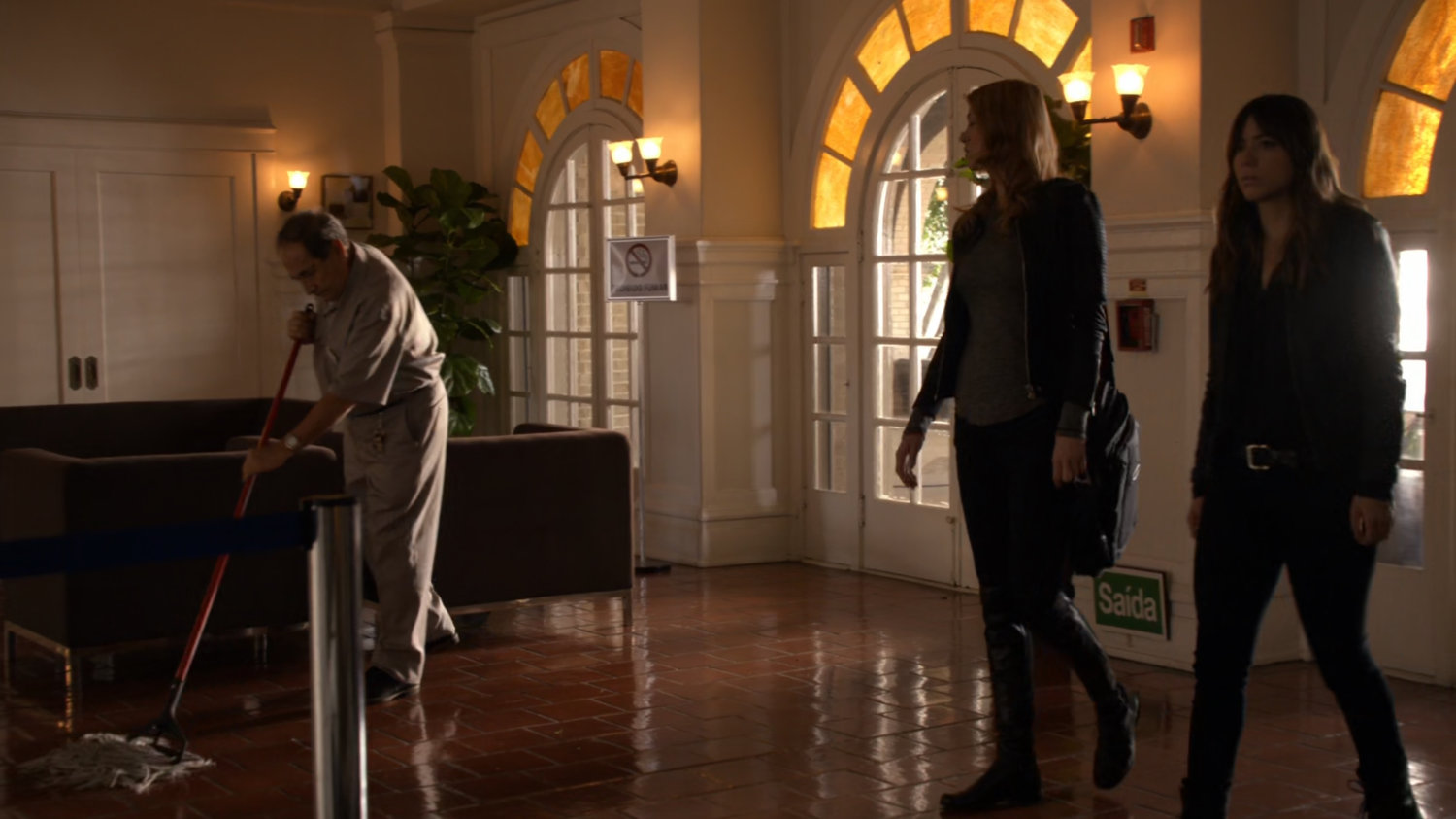 Bobbi and Skye enter Faro hospital.