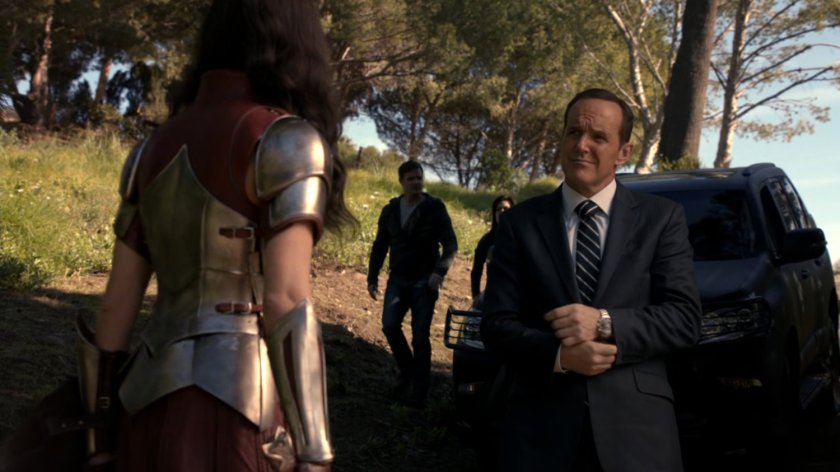 Sif and Coulson in woods.