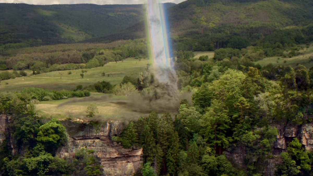 Bifrost beam hits ground in wooded area.