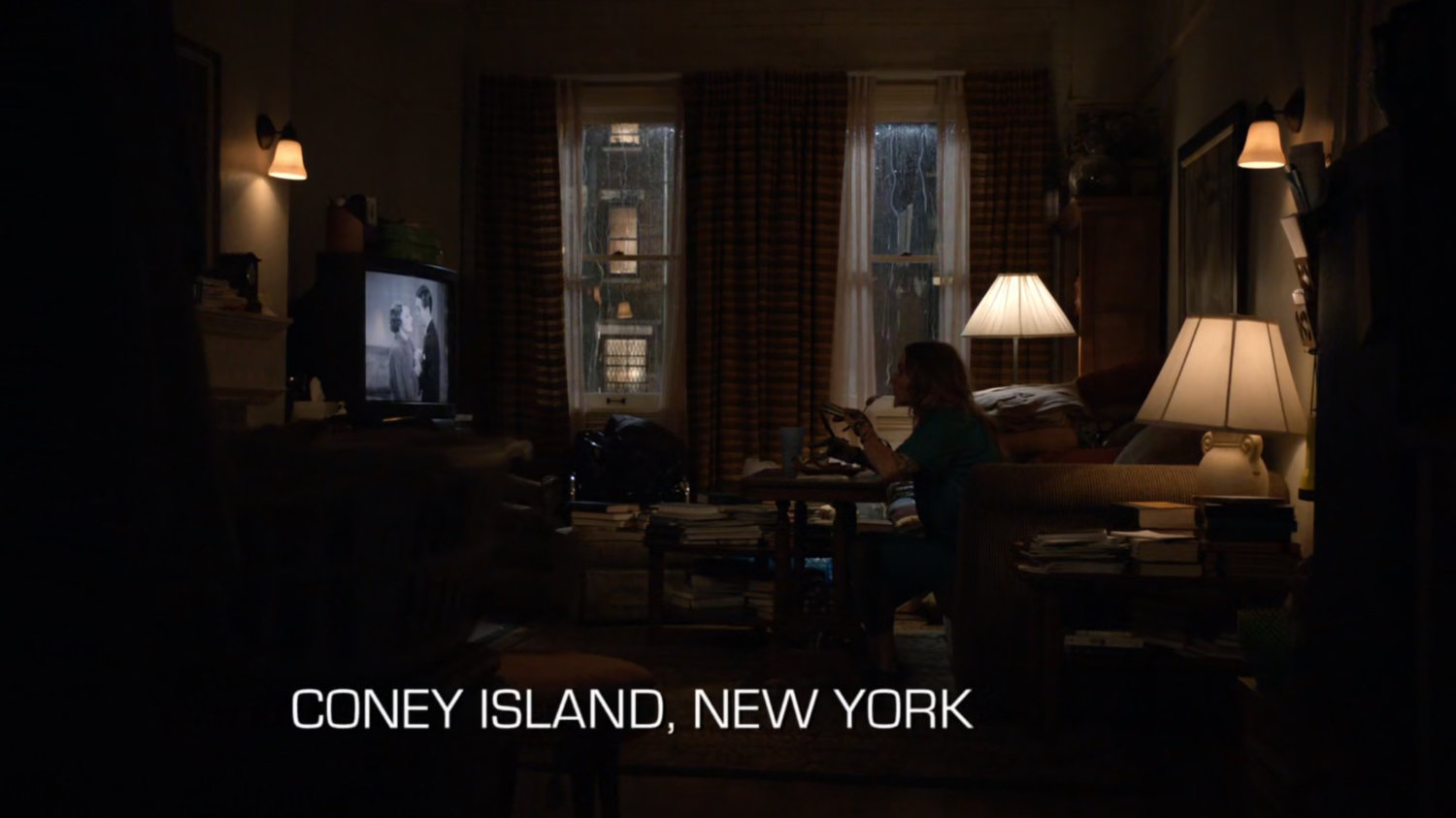 Carla Gideon's apartment. Text: Coney Island, New York.