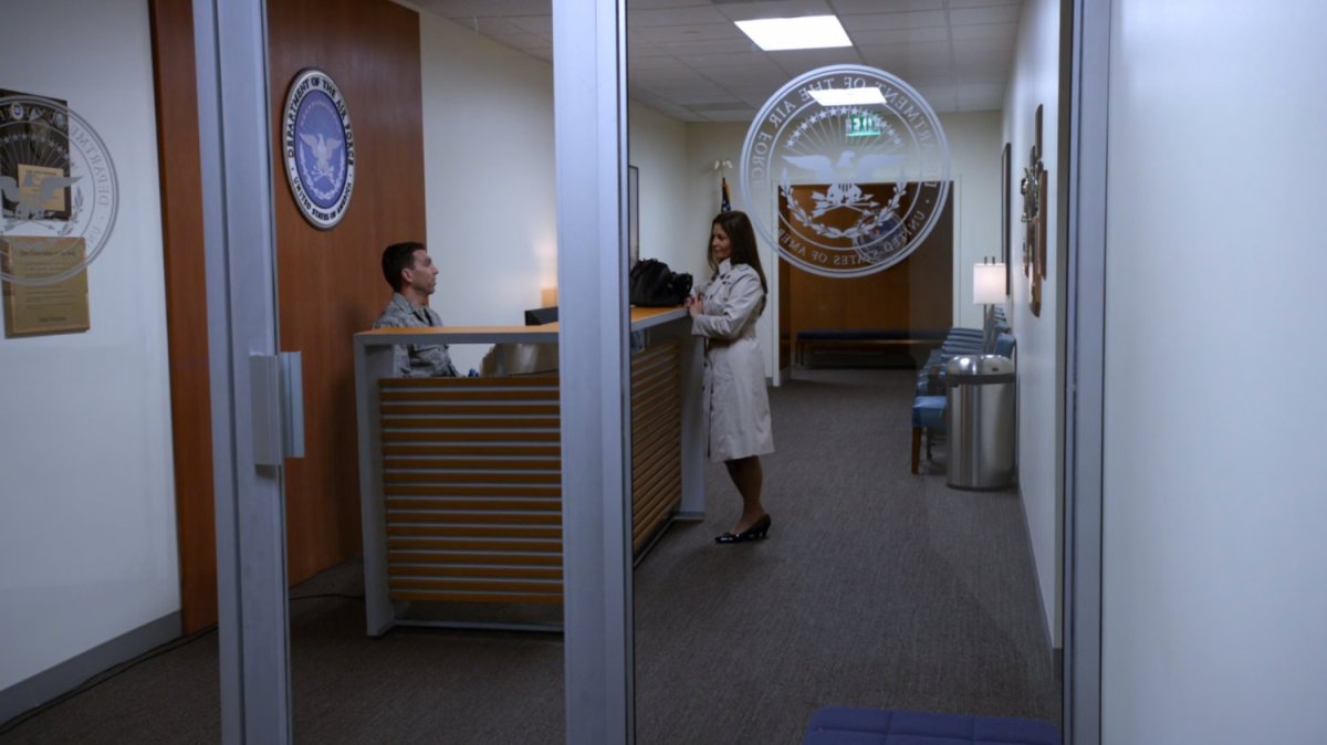 Carla Talbot at front desk of the Department of the Air Force.