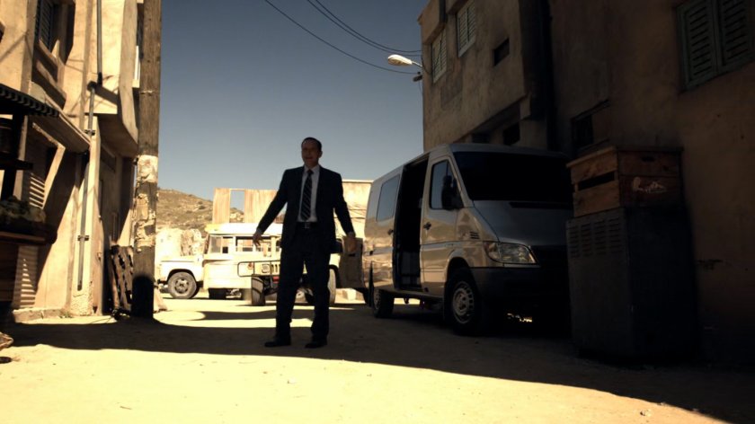 Coulson on dirt street in Bahrain.