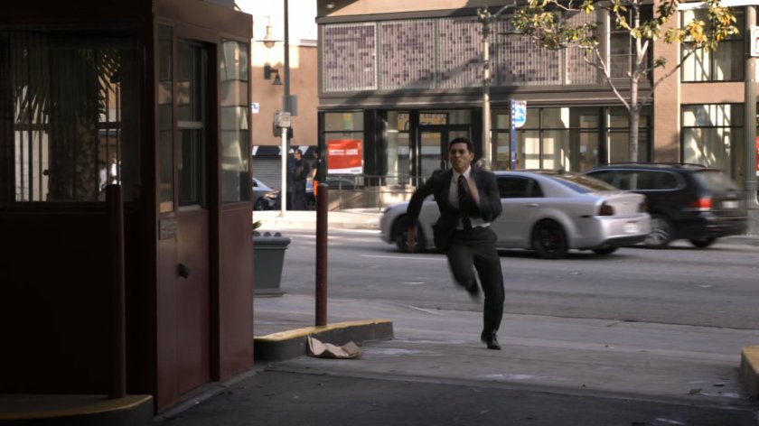 Man running into San Francisco alley.