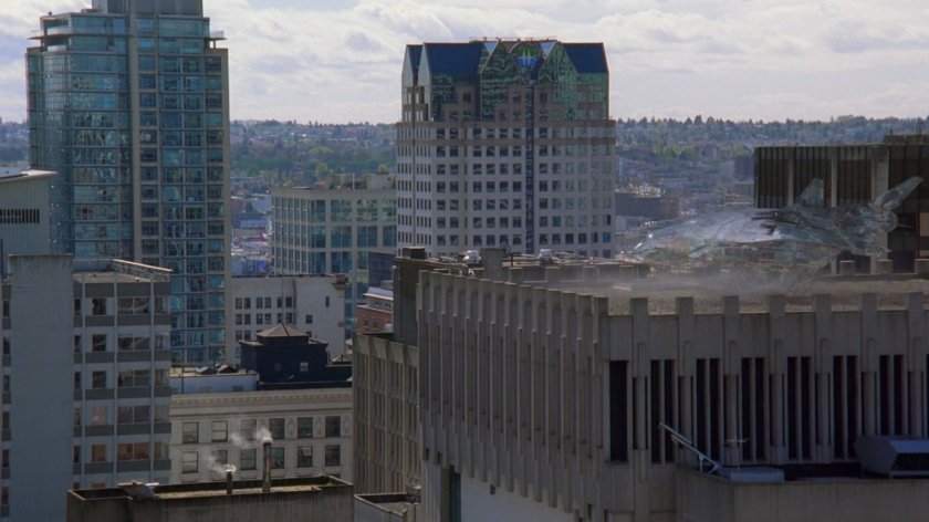 An invisible quinjet lands on the roof of an old Milwaukee building.