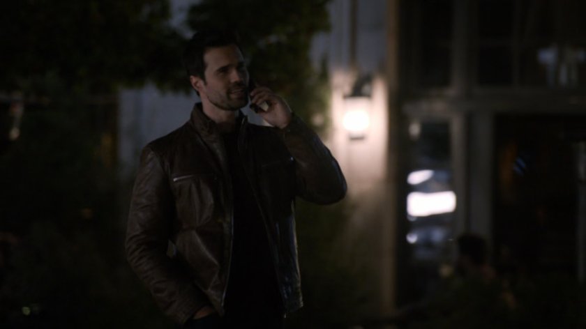 Ward on a nighttime sidewalk.