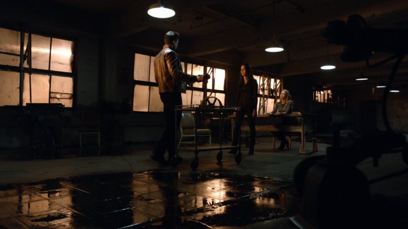 Ward and Agent 33 hold Bobbi hostage in an abandoned Spanish warehouse.