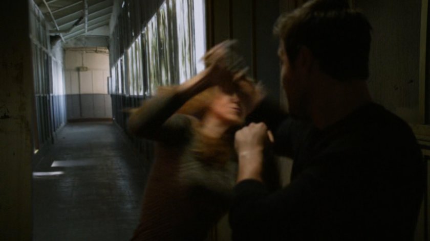 Bobbi and Ward fight in an abandoned Spanish warehouse.