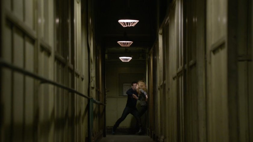 Bobbi and Ward fight in an abandoned Spanish warehouse.