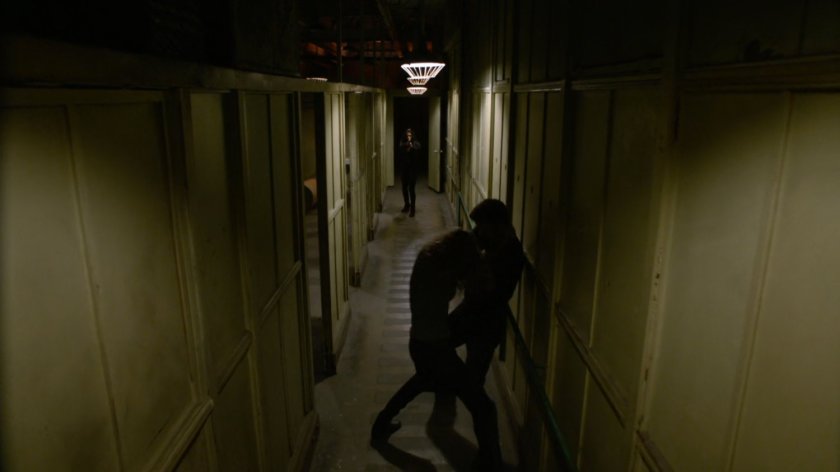 Bobbi and Ward fight in an abandoned Spanish warehouse.