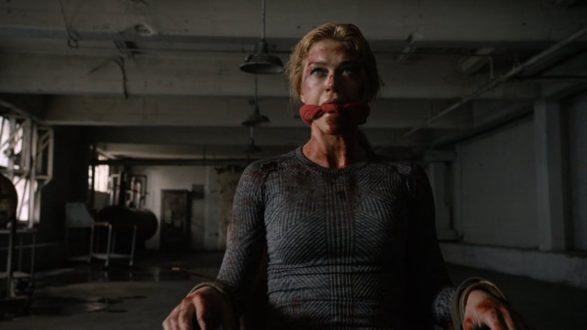 Bobbi bound and gagged inside an abandoned Spanish warehouse.