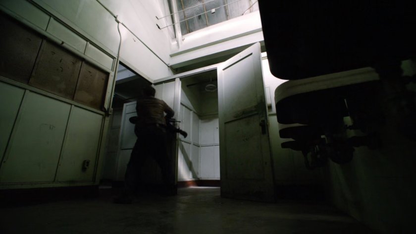 Ward fights SHIELD agent in an abandoned Spanish warehouse.