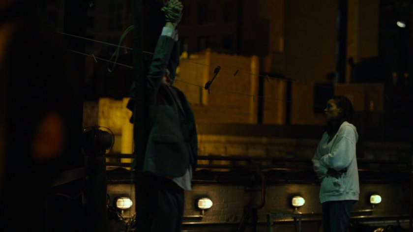 Matt interrogates mobster on rooftop of Claire's Apartment building.