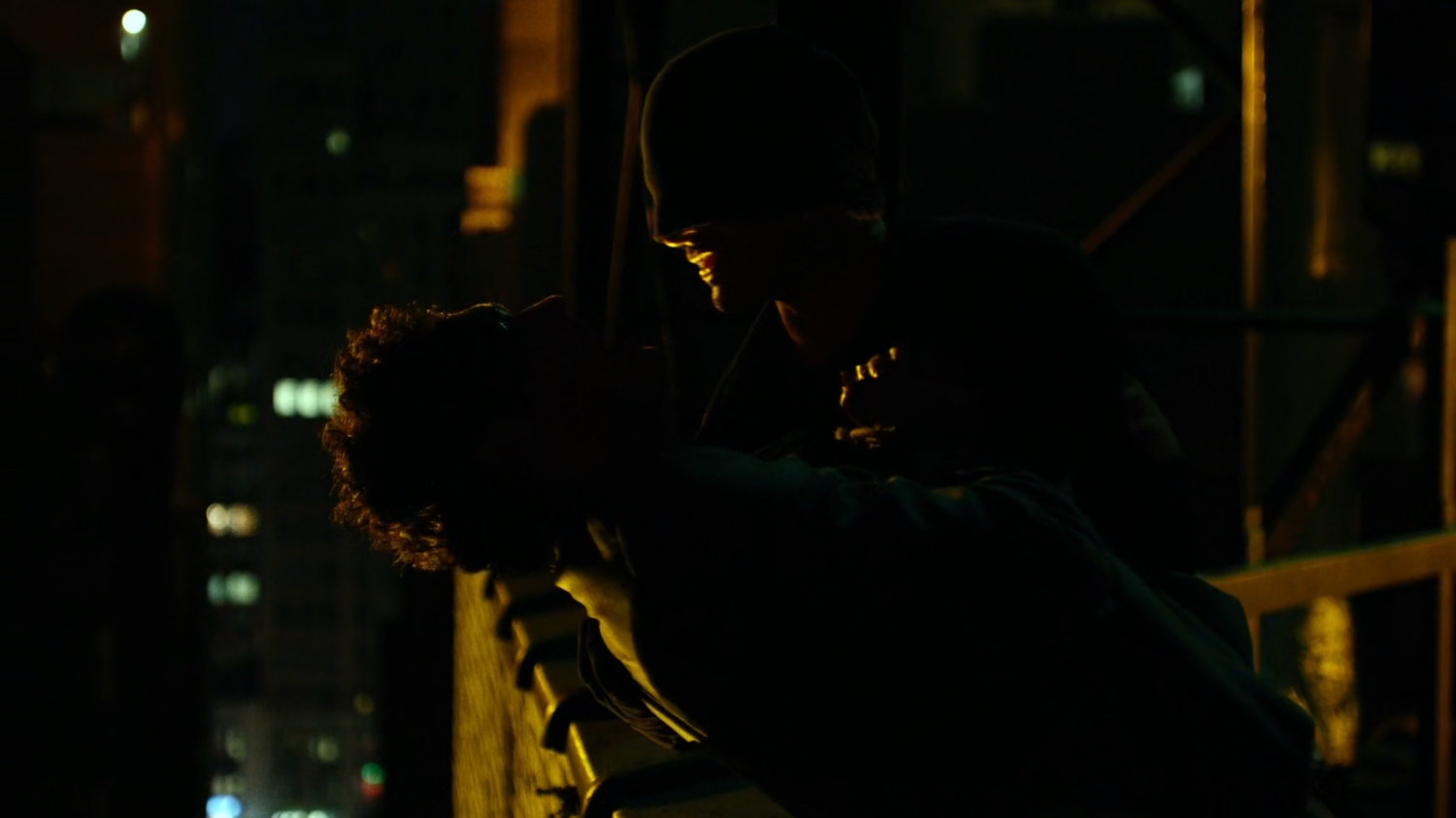 Matt interrogates mobster on rooftop of Claire's Apartment building.