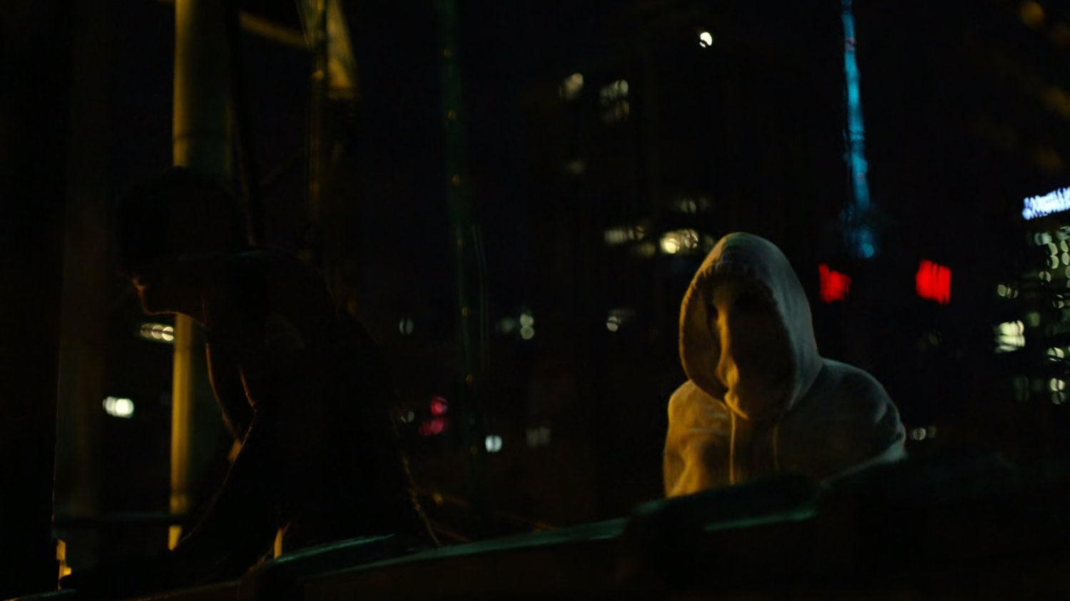 Matt interrogates mobster on rooftop of Claire's Apartment building.