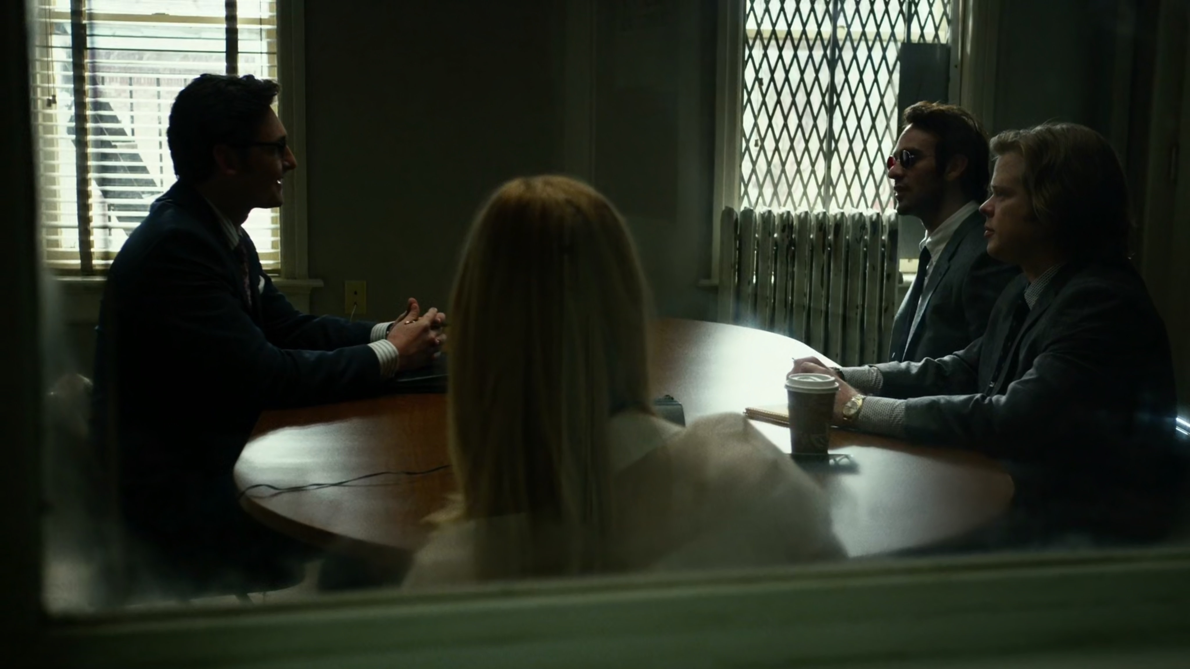 Matt and Foggy with Karen meet with Wesley inside Nelson and Murdock offices.