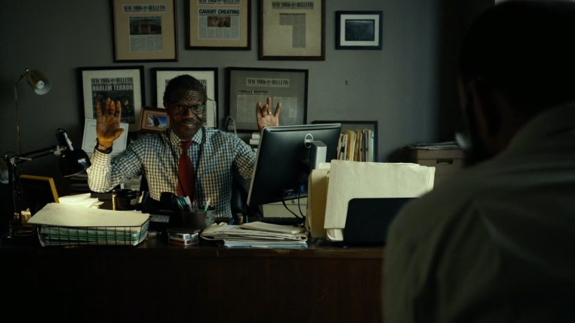 Ben Urich in his office.