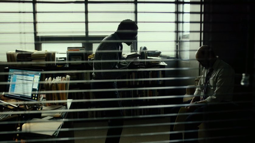 Ellison and Ben Urich in his office.