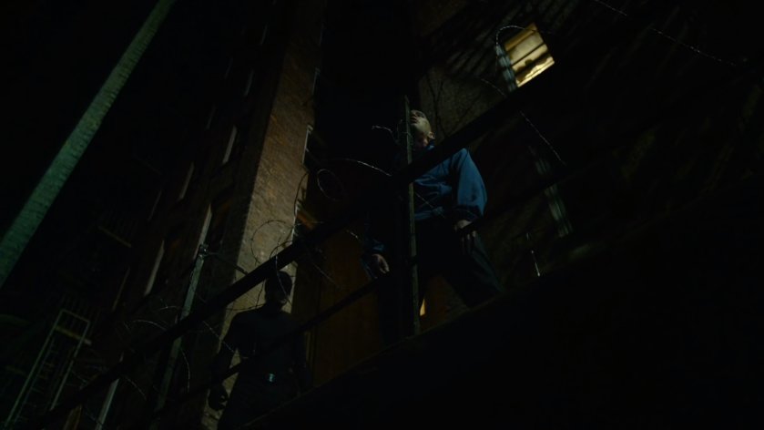 Healy dead in dark alley.