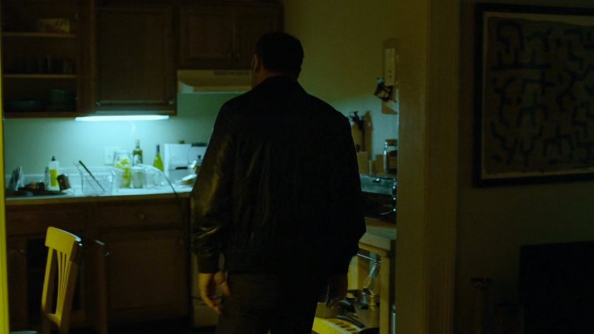 Russian mobster inside Claire's Apartment.