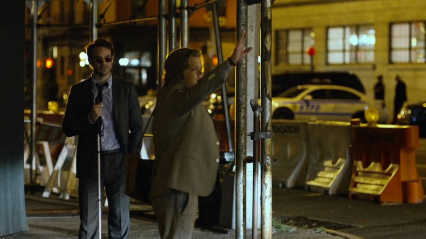 Matt and Foggy at intersection at night.