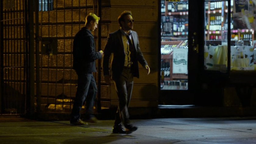 Matt on sidewalk outside Claire's co-worker's apartment.