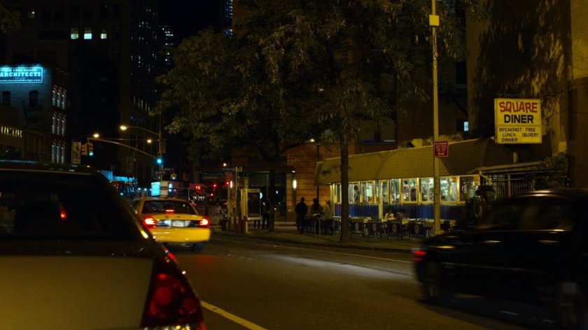 Exterior of Square Diner, night.