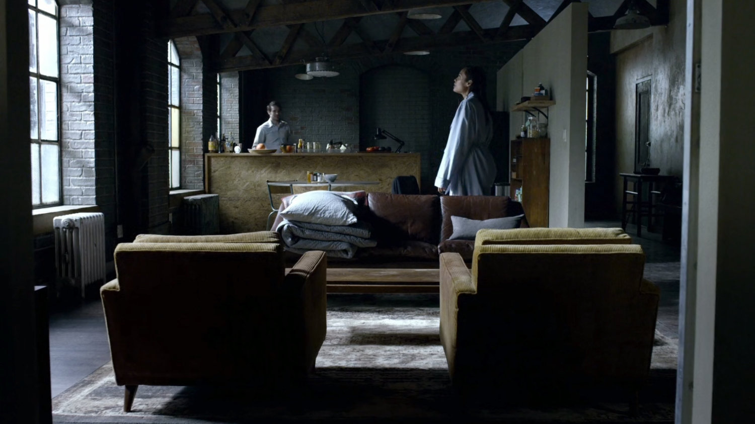 Matt and Claire in his apartment.