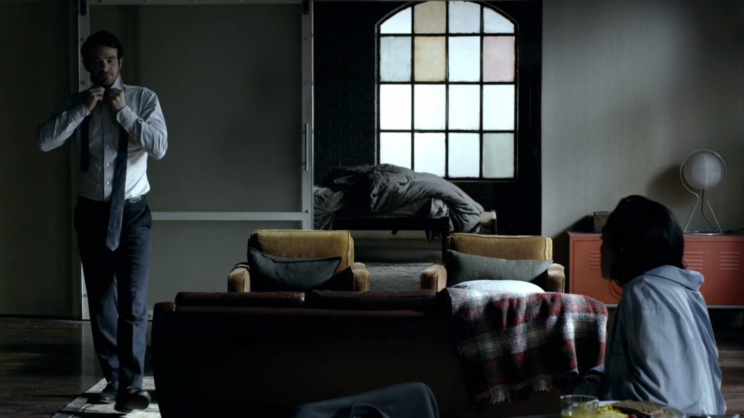 Matt and Claire in his apartment.