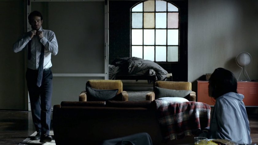 Matt and Claire in his apartment.