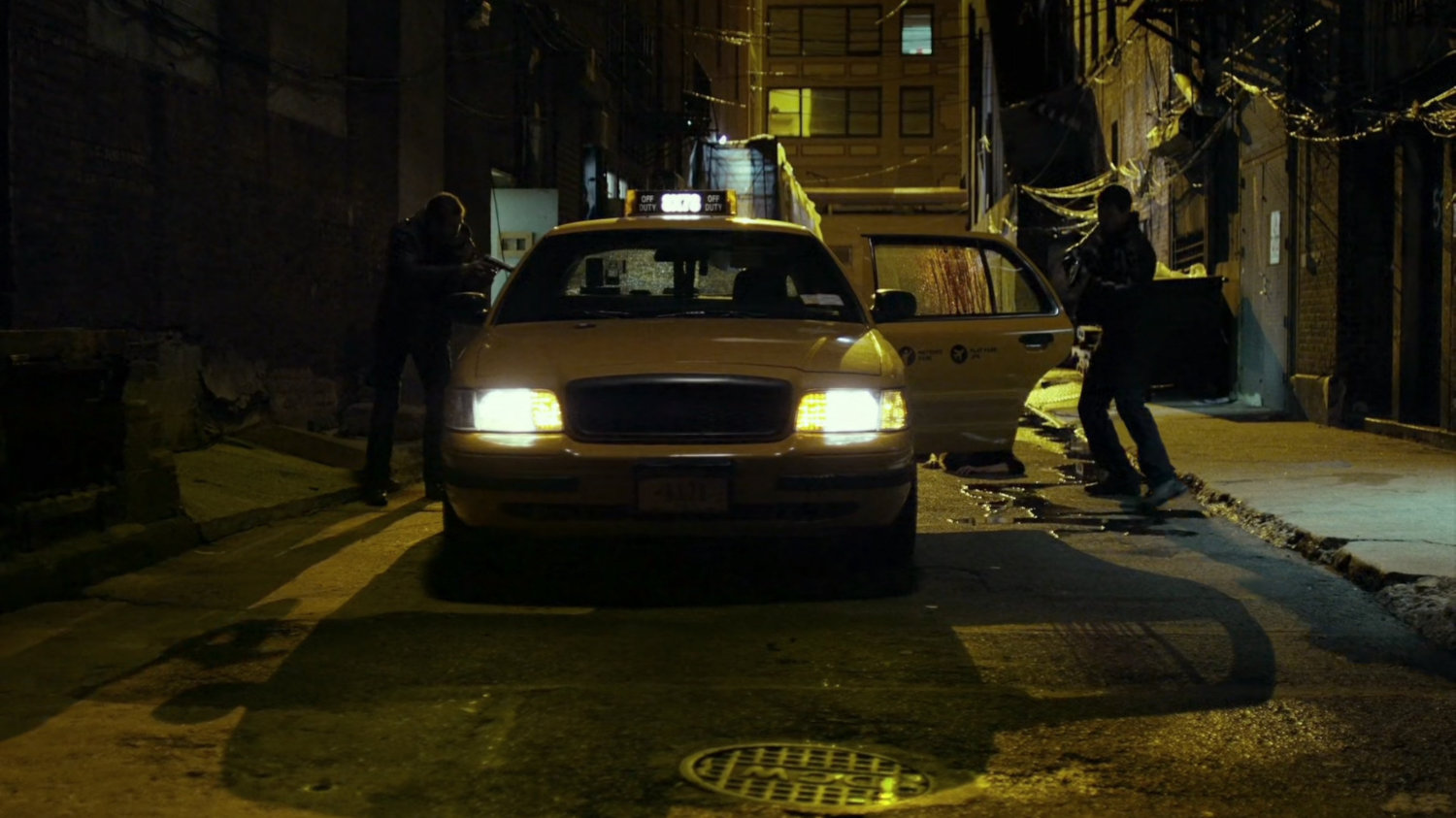 Russians point guns at taxi in alley behind Madame Gao's warehouse.