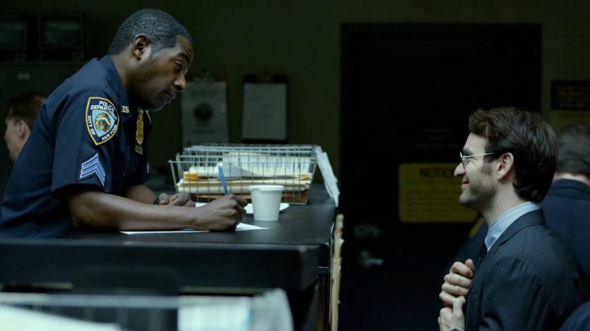 Officer Brett Mahoney and Matt at 15th Precinct front desk.