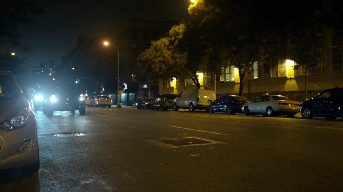 Fisk motorcade on city street.
