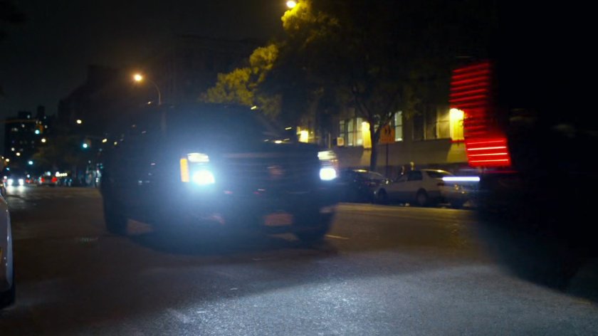 Fisk motorcade on city street.