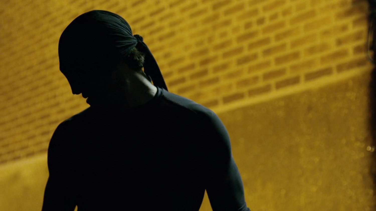 Daredevil outside back door of 15th Precinct.