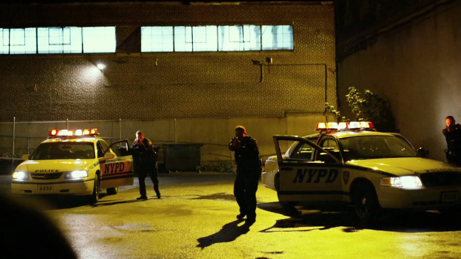 Police draw guns on Daredevil in pallet yard outside Russian warehouse.