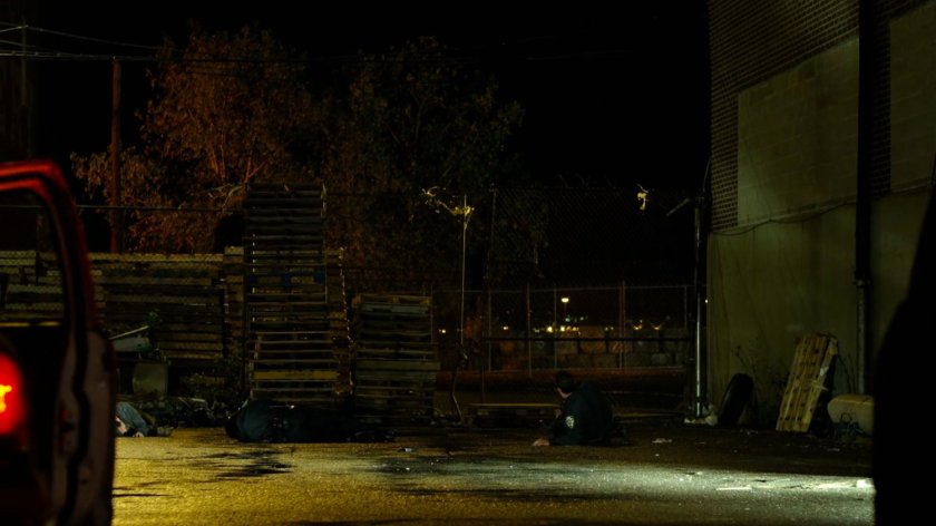 Exterior of pallet yard outside Russian warehouse.