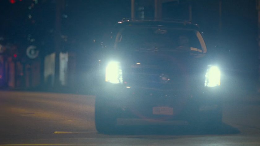 Fisk motorcade on city street.