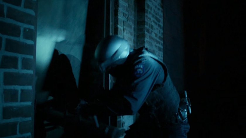 ESU team entering abandoned warehouse.