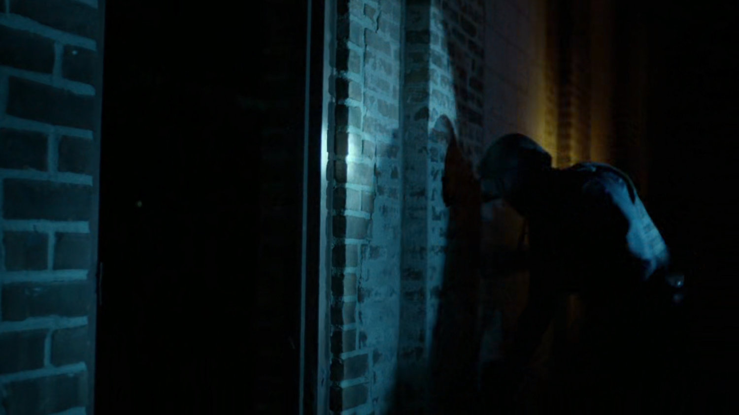 ESU team entering abandoned warehouse.