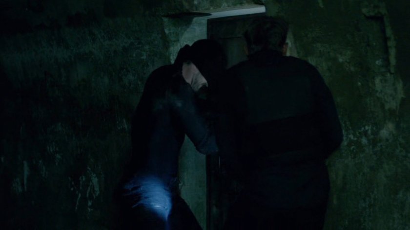 Daredevil and Vladimir in access tunnels under an abandoned warehouse.