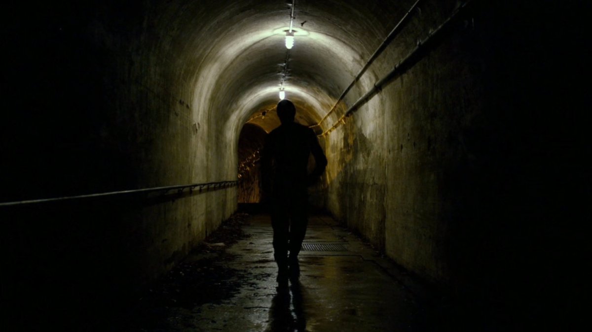 Daredevil in access tunnels under an abandoned warehouse.