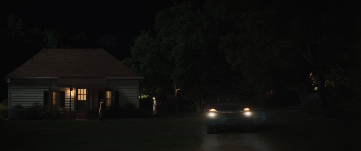 Nighttime outside the Lopez house.