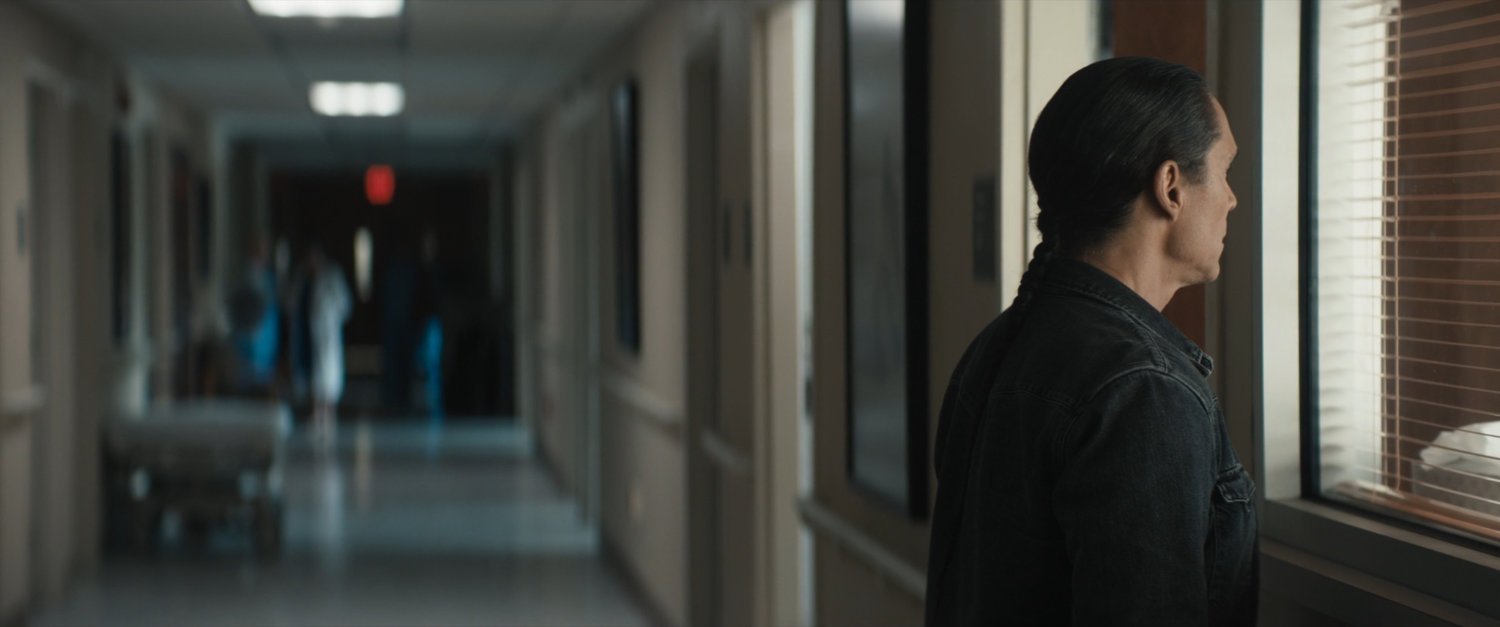 William in a hospital hallway.