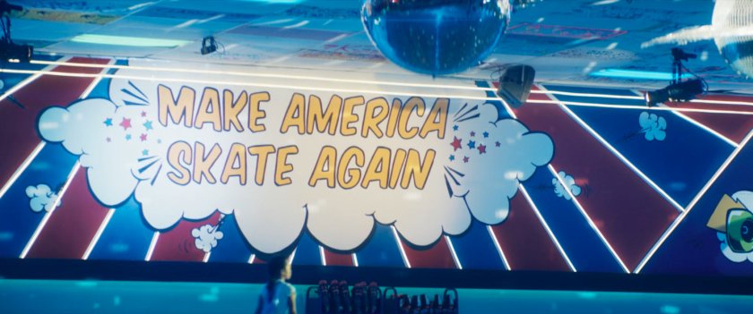 Interior of Black Crow's SkateLife Roller Skating, with sign "Make America Skate Again."