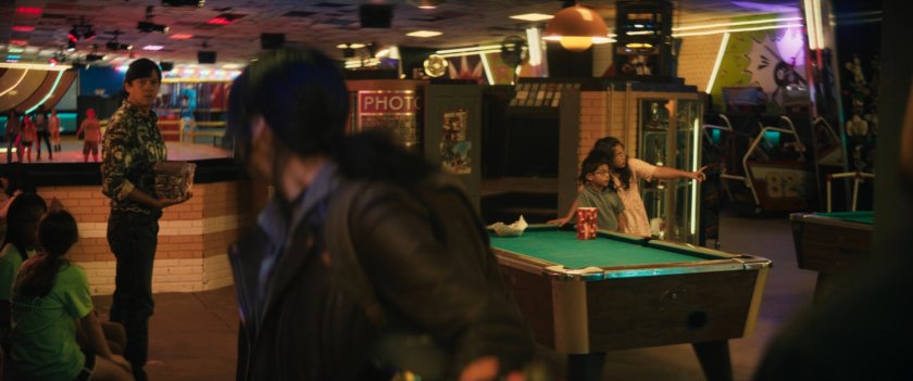 Maya sees Henry inside of Black Crow's SkateLife Roller Skating.