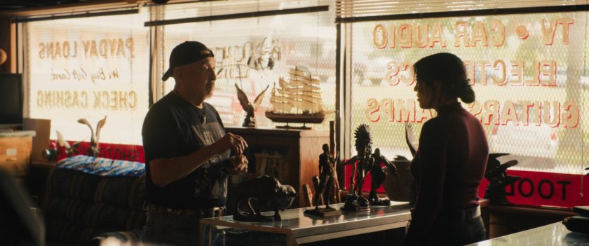 Skully and Maya inside Skully's Pawn shop.