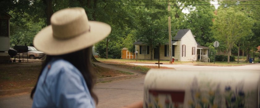 Chula delivering mail and looking at intersection in Tamaha.