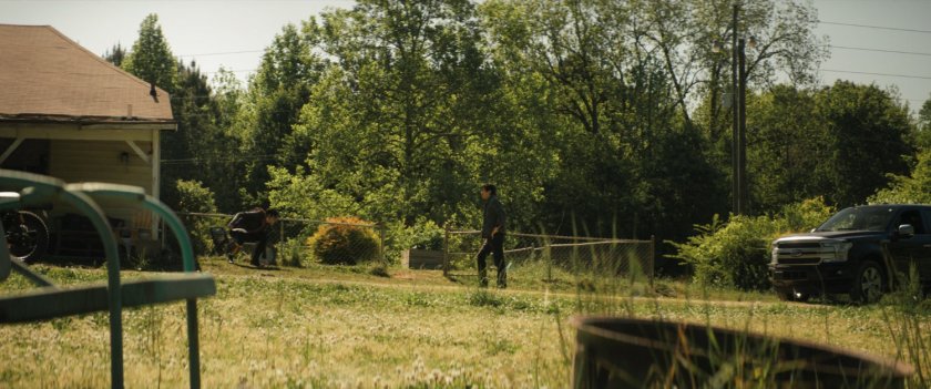 Maya jumps off roof of Lopez house with Henry nearby.