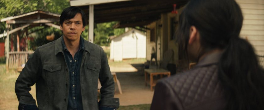 Maya and Henry outside Lopez house.